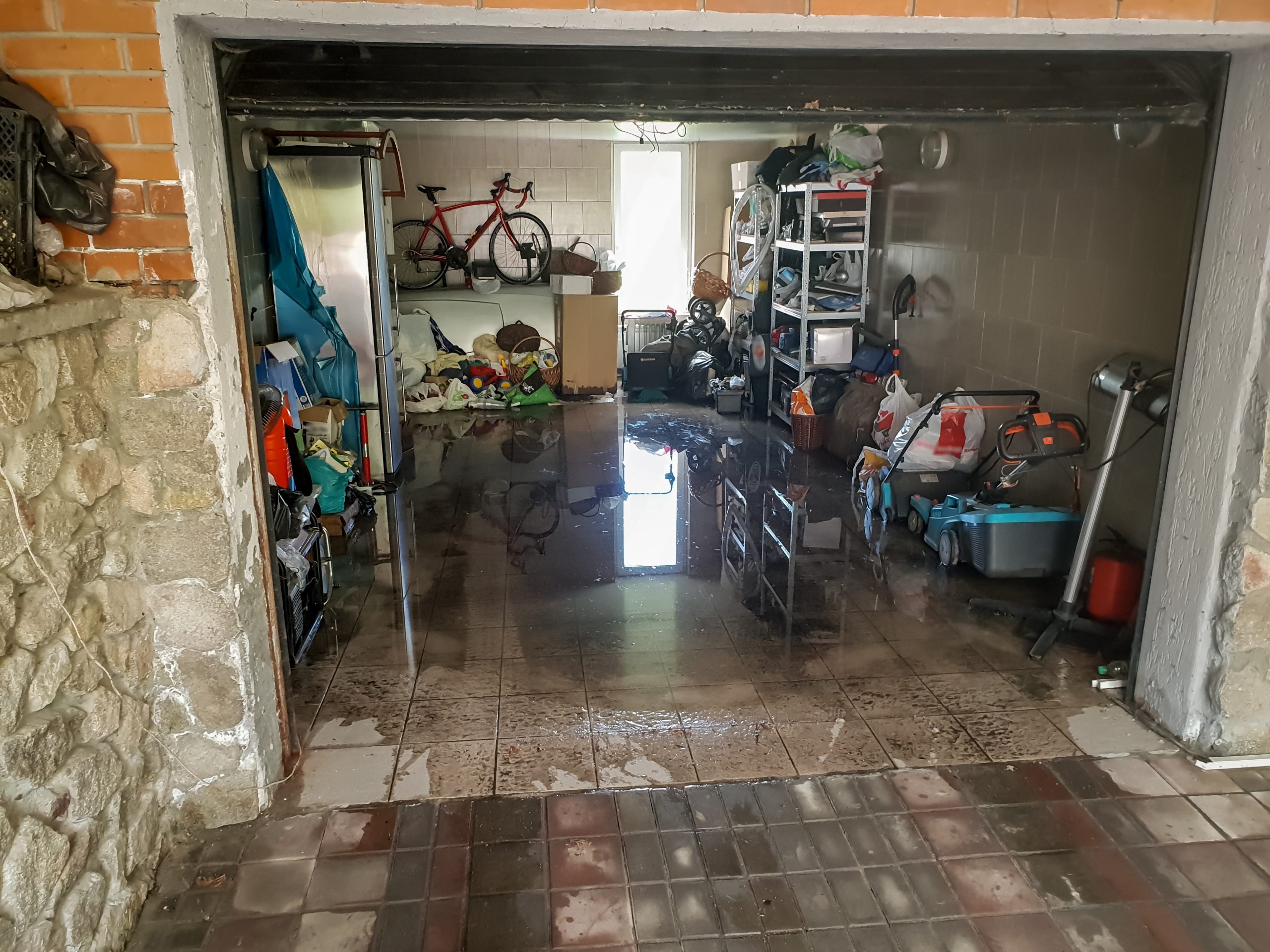 Flooded garage with standing water