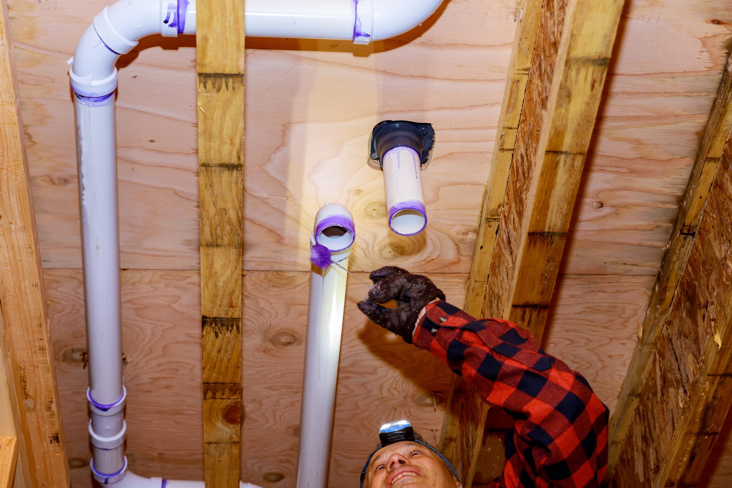 Applying primer to PVC pipe joints
